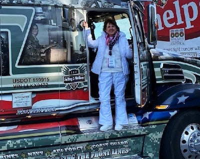 Jill Williams, pictured with the truck piloted by one of those truckers.