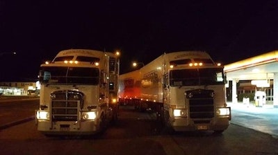 For a time, both father and son were trucking for the same company in these two cabovers. Kevin is still with the fleet.
